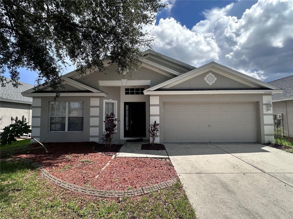 Photo of 11551 Misty Isle Lane, Riverview, FL 33579 (MLS # TB8547295)