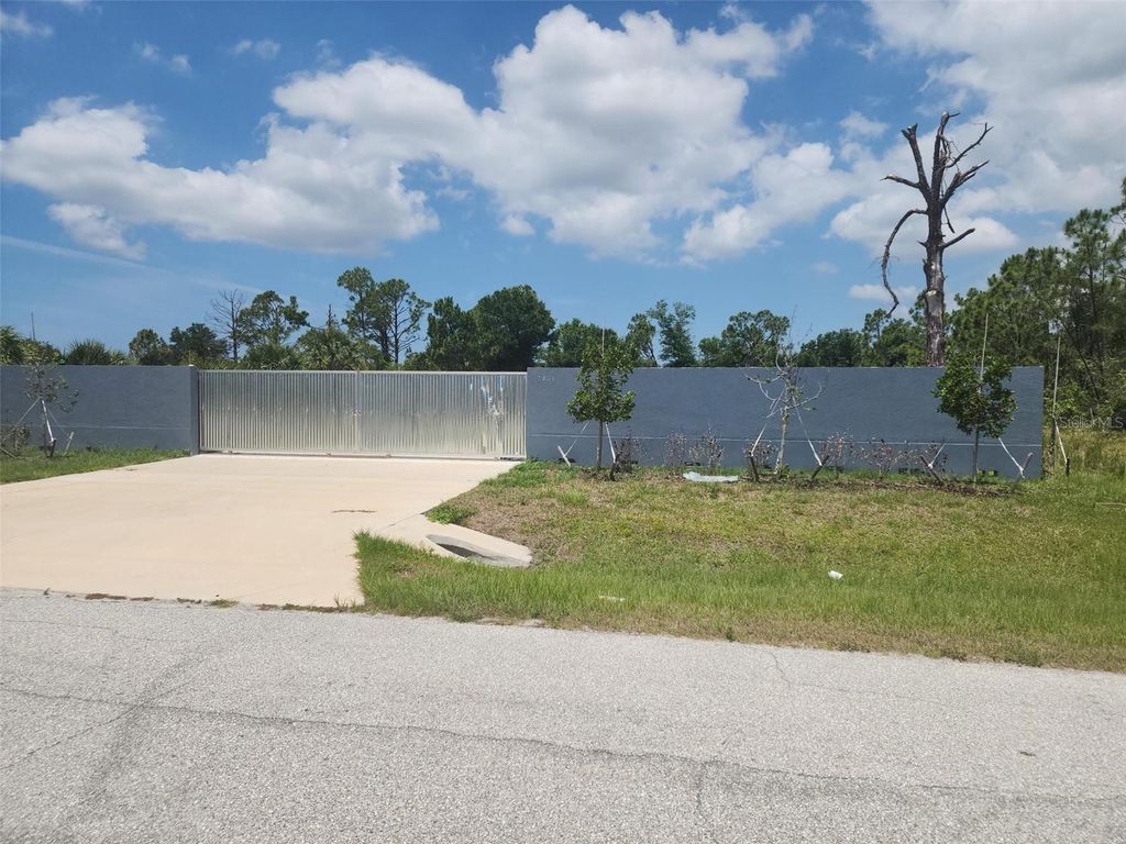 Photo of 7401 Sawyer Circle, Port Charlotte, FL 33981 (MLS # C7515649)
