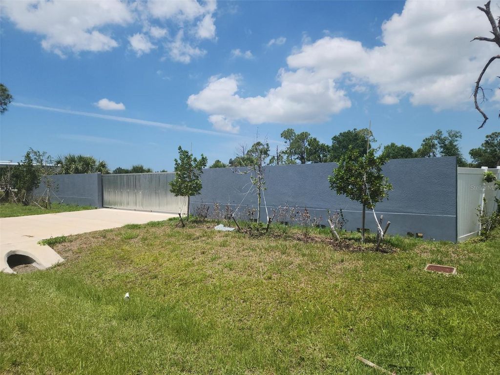 Photo of 7401 Sawyer Circle, Port Charlotte, FL 33981 (MLS # C7515649)