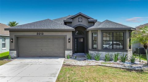 Photo of 5013 Terra Vista Way, Orlando, FL 32837 (MLS # O6410831)