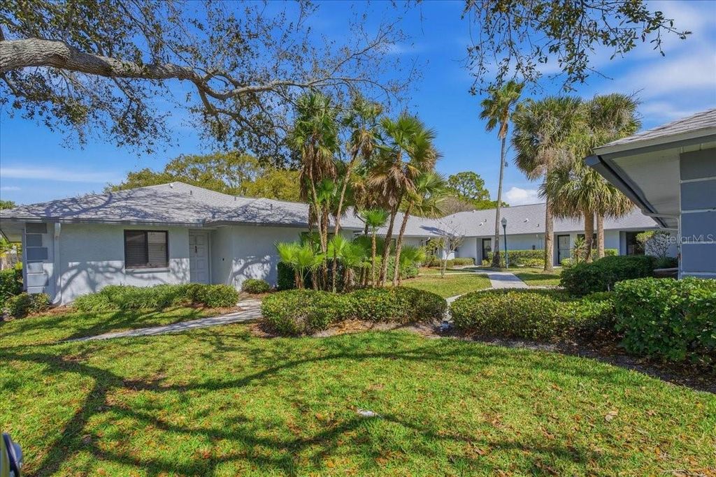 Photo of 2761 Countryside Boulevard #105, Clearwater, FL 33761 (MLS # TB8485949)