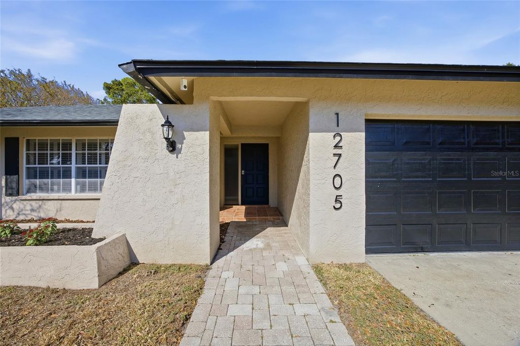 Photo of 12705 Allendale Lane, Tampa, FL 33618 (MLS # TB8450568)