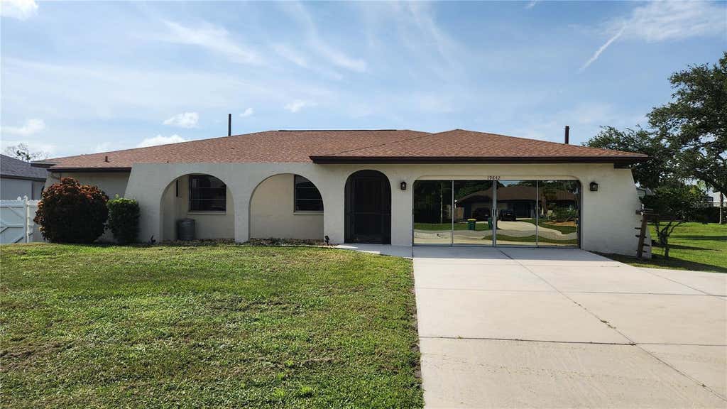 Photo of 19842 Midway Blvd, Port Charlotte, FL 33948 (MLS # C7529000)