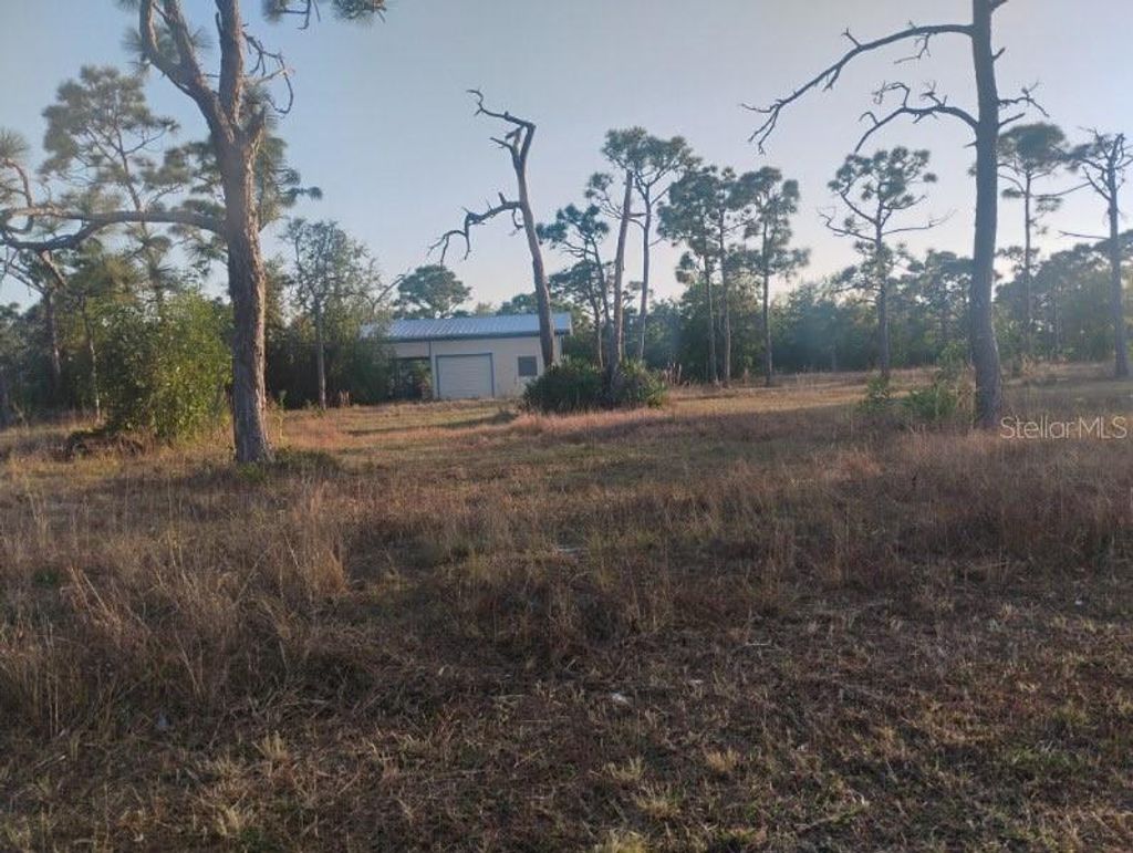 Photo of 6820 Stringfellow Road, St James City, FL 33956 (MLS # NS1087443)