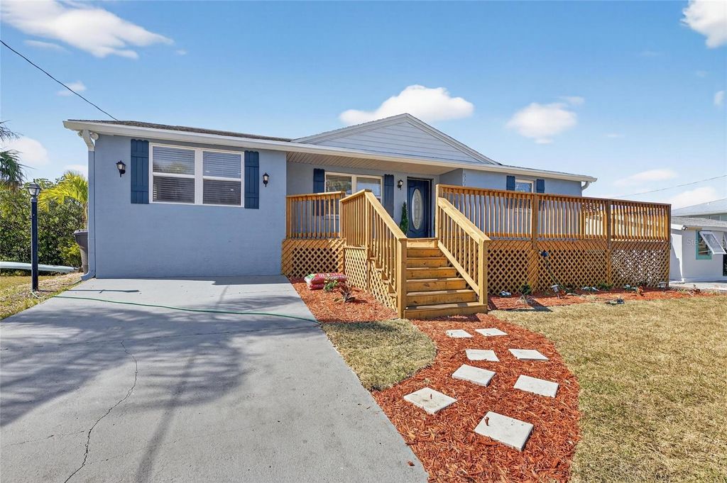 Photo of 827 Seabreeze Drive, Ruskin, FL 33570 (MLS # TB8475129)