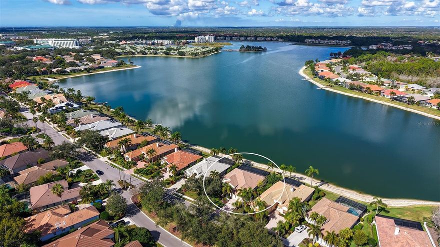 Spectacular Lakefront Living in Edgewater Village — 6619 Waters Edge Way
Welcome to your gorgeously updated dream home with infinity lake views overlooking the 160-acre Lake Uihlein in the highly sought-after community of Edgewater Village at Lakewood Ranch! This is a custom Rutenberg home and has over $150,000 in renovations in the past 3 years, showcasing an exceptional combination of indoor elegance and outdoor paradise with breathtaking year-round lake views.
With 3 spacious bedrooms, a newly created dedicated office, and 2 fully updated bathrooms, this home delivers both comfort and style in an exceptional open floor plan. The beautifully renovated kitchen overlooks the spacious family room with a linear fireplace, and features stylish cabinetry, quartz countertops and high-end appliances with an oversized island and pendant lighting.  You will be thoroughly impressed with the newly created garage entry mudroom/drop zone with custom bench and cubbies alongside countertop cabinetry with beverage/wine fridge, pantry and storage closet.  Additional storage has been created in the laundry room with overhead cabinetry and commercial sink.
Step outside through sliders to your private, screened lanai, replaced in 2022 with a picture window pool cage, and enjoy a sparkling pool that has been totally resurfaced, retiled and converted to a saltwater with new gas pool pump.  The surrounding serene water vistas — your own peaceful retreat for morning coffee or evening sunsets. The seamless indoor-outdoor flow provides exceptional space for relaxation and entertaining with a spectacular view.
Live the Florida lifestyle to the fullest in a home that is move in ready and perfectly blends comfort, style, and waterfront tranquility — all just moments from both Waterside and Lakewood Ranch’s Main Street restaurants, shopping, trails, and top-rated amenities.