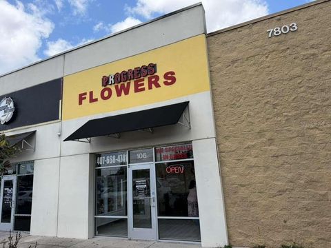 Photo of 7803 E Colonial Drive #106, Orlando, FL 32807 (MLS # O6401449)