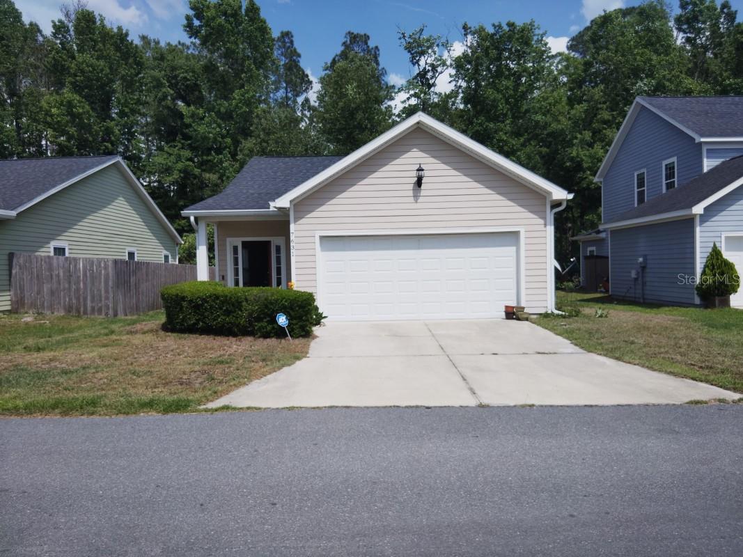 Built in 2016, this welcoming single-story home offers 3 bedrooms and 2 bathrooms across approximately 1,241?sq?ft of living space on a neat 0.10-acre lot in the Buck Bay Replat neighborhood. Featuring durable central heat and air, the home is ideal for low-maintenance living with a functional layout suitable for singles, couples, or small families . The exterior showcases hardi-board siding and a two-car garage, sitting comfortably among similar well-maintained homes in the area. Its prime location offers easy access to the University of Florida, local schools, healthcare facilities, shops, and dining.