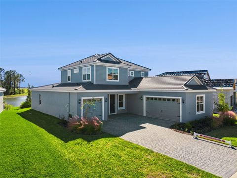 Photo of 2574 Wise River Lane, Zephyrhills, FL 33541 (MLS # O6338829)