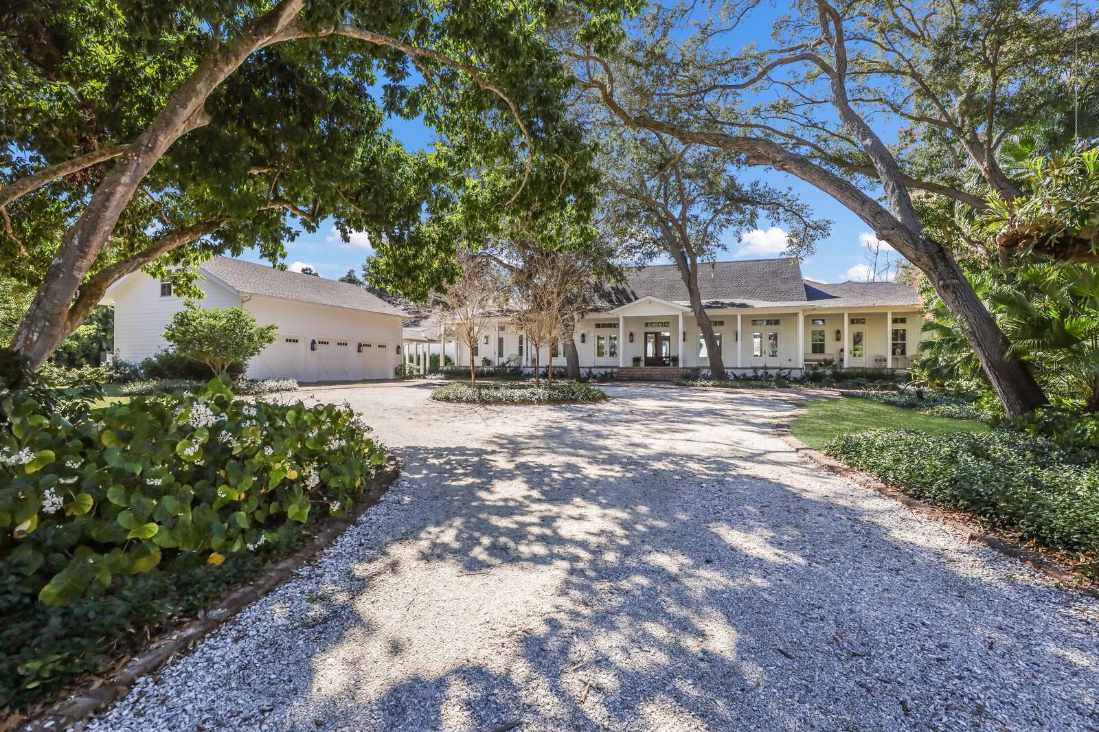 THE CROWN JEWEL OF THE MANATEE RIVER!!! Once in a lifetime opportunity to own this magnificent gated riverfront estate. LITERALLY NOTHING ELSE LIKE IT...THE LARGEST PARCEL ON THE MANATEE RIVER with direct access to the Gulf of Mexico. Would make an incredible FAMILY COMPOUND! You could put multiple homes on this extraordinary property and truly live in a secluded compound. Truly one of the most desirable deep water parcels on the entire west coast of Florida. Experience unparalleled privacy in this compound nestled on the shores of Snead Island! Spanning an impressive 7.45 acres, this extraordinary property boasts two houses and over 372 feet of direct deep water river frontage! The main house, a custom-built coastal farmhouse with 4 bedrooms, 3.5 bathrooms and over 6000 sq ft of living space was built in 2018 and offers a seamless blend of modern luxury and Old Florida charm. As you enter through the main gate, a scenic drive takes you through a historic mango plantation adorned with majestic oak and mango trees, embodying the essence of Old Florida's natural beauty. The main house is a masterpiece of design, featuring cathedral ceilings, transom windows, and a spacious great room that opens to a massive pool overlooking the Manatee River. DIRECT RIVER VIEWS FROM JUST ABOUT EVERY SINGLE ROOM! Step into the kitchen, a haven for any gourmet chef, equipped with pristine cabinetry, high-end appliances, and a remarkable kitchen island. The bedrooms and baths, bathed in natural light, offer captivating river views. With spectacular designer finishes, this new construction home meets today's stringent standards including full hurricane protection for all windows and doors. The outdoor living space is a true extension of luxury, designed for entertaining and relaxation. From sitting areas around a double-sided fireplace to an outdoor kitchen, this space is highlighted by a large saltwater heated pool and spa overlooking a gorgeous WHITE SANDY BEACH! Boaters will appreciate the deep water access with no bridges, complete with a newer dock featuring 2 boat lifts. Adding to the allure of this property is a meticulously preserved guest cottage offering 1 bedroom, 1.5 baths, and a 2-car garage that is perfect for friends, family or a live in caretaker. This expansive parcel of land provides a rare opportunity to create a FAMILY COMPOUND or easily SPLIT INTO MULTIPLE LOTS. The possibilities are nearly limitless, making this property more than a home – it's a way of life. Located on one of the undiscovered treasures of the West Coast of Florida--Snead Island. Whether you enjoy dining or boating at the local Yacht Club, biking or kayaking all of the trails of the 365 acre Emerson State Park, or seeing the horses at the local stable, Snead Island truly has something for everyone and is old Florida living at its best! Seize this once-in-a-lifetime chance to tour and embrace the magnificence of this estate before it's gone for good!