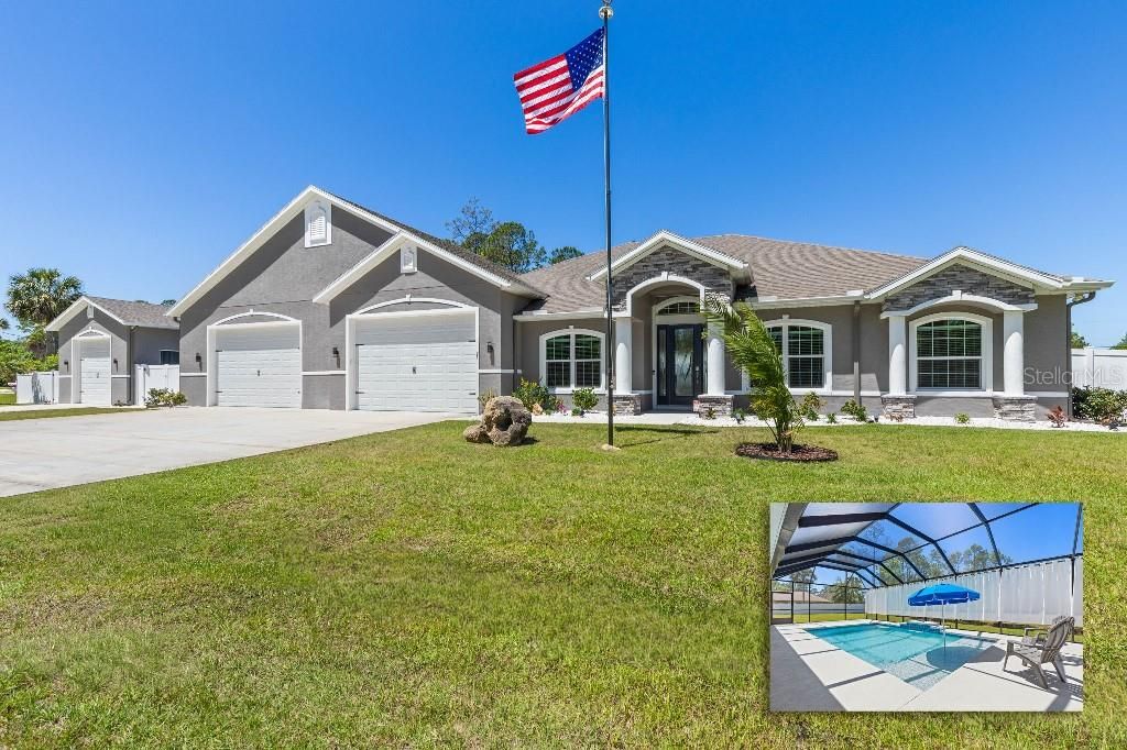 Photo of 23 Poinciana Lane, Palm Coast, FL 32164 (MLS # TB8510984)