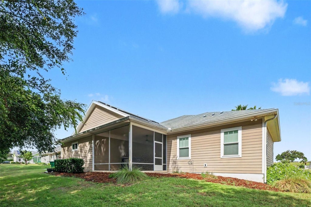 Photo of 1182 Fiesta Key Cir, Lady Lake, FL 32159 (MLS # TB8538956)