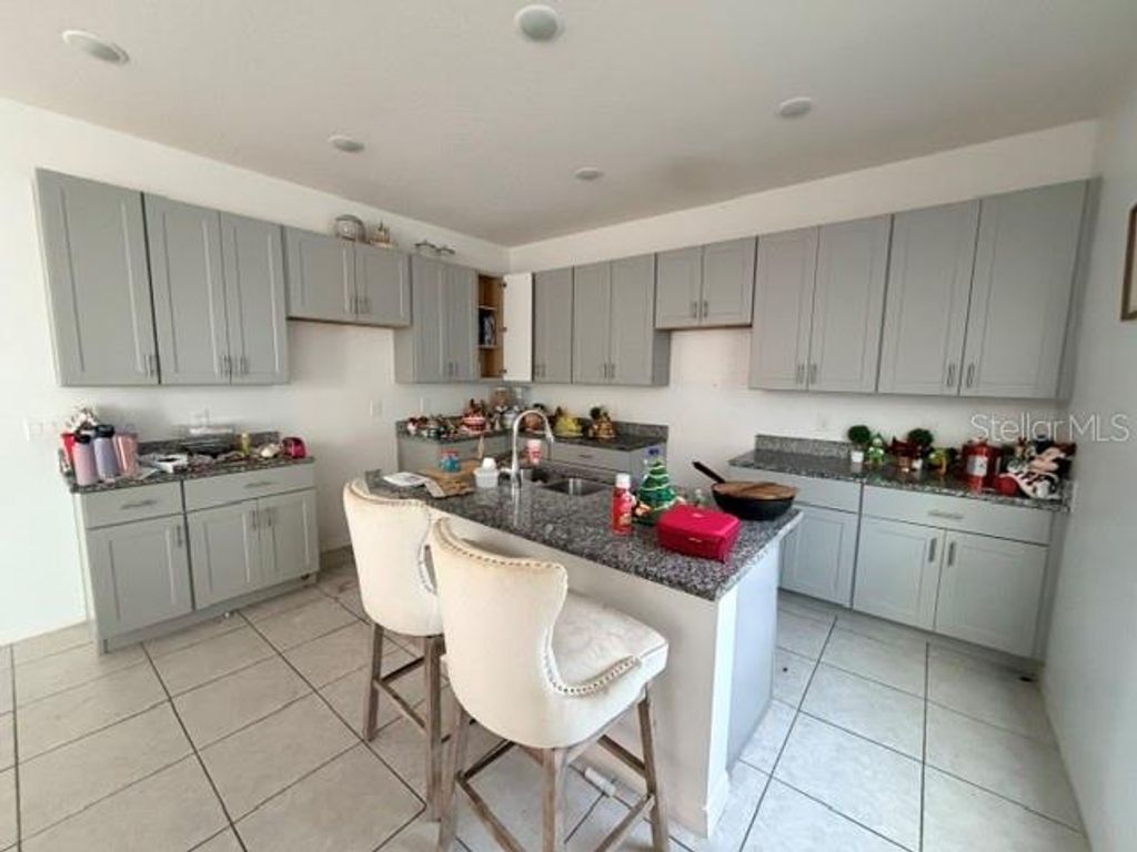 Photo of 270 Tarpon Bay Boulevard, Haines City, FL 33844 (MLS # O6415196)