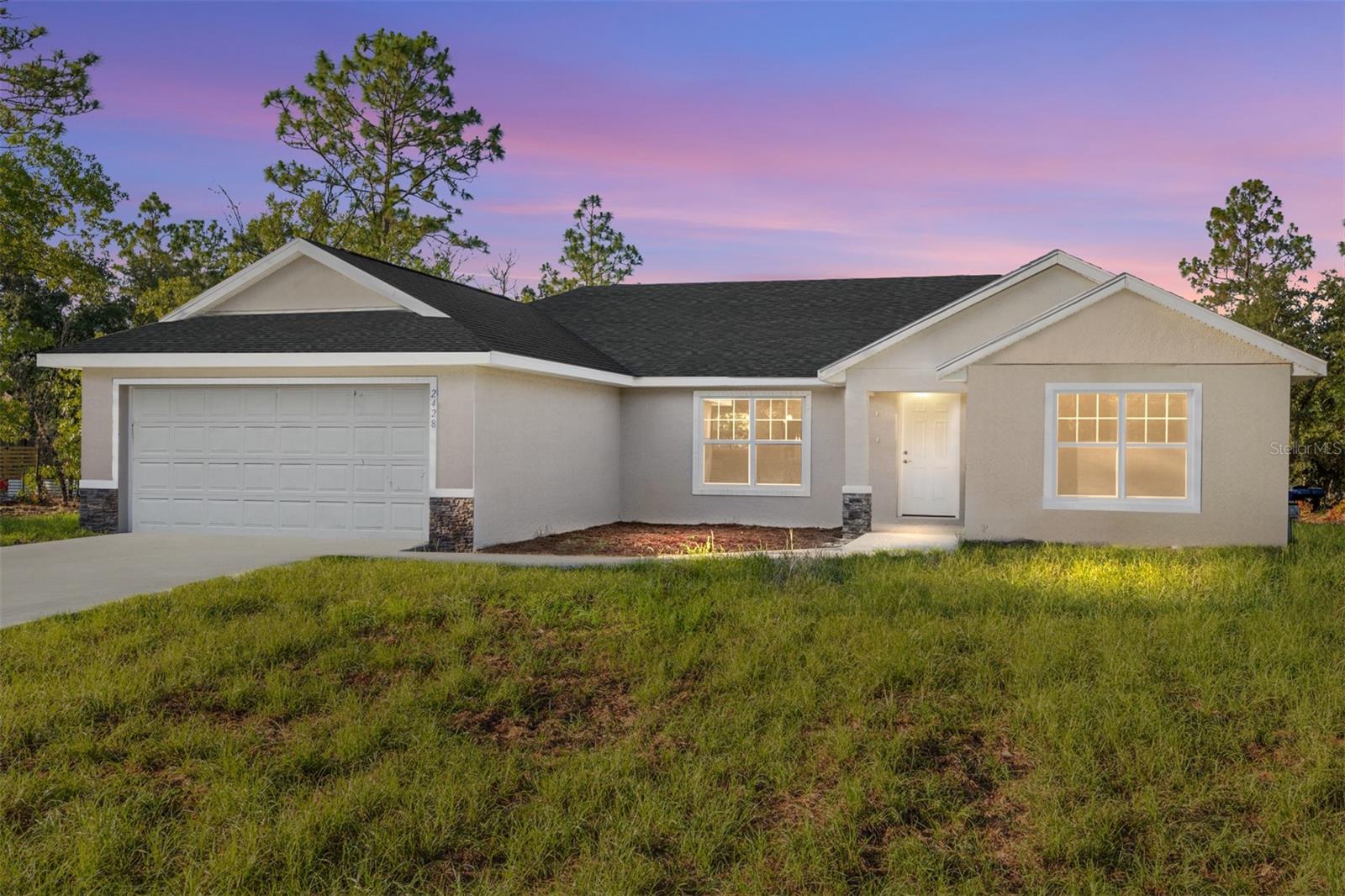 One or more photo(s) has been virtually staged. Home is complete!! This gorgeous brand-new home located in Citrus Springs is the ideal escape from the hustle and bustle of city life! With an open floor plan, pleasing neutral colors and vinyl plank flooring throughout, this 3-bedroom, 2-bathroom residence has all the charm and comfort any family could desire. Showcasing shaker style cabinets with granite counter tops in the kitchen, a washer/dryer hook up in the inside laundry for added convenience, plus a stainless-steel appliance package, this home is sure to impress. Enjoy your time in the neighborhood while nearby shopping, dining, medical centers and natural springs keep life exciting. Plus, its location near pristine rivers and springs allows for outdoor activities where adventure finds you!