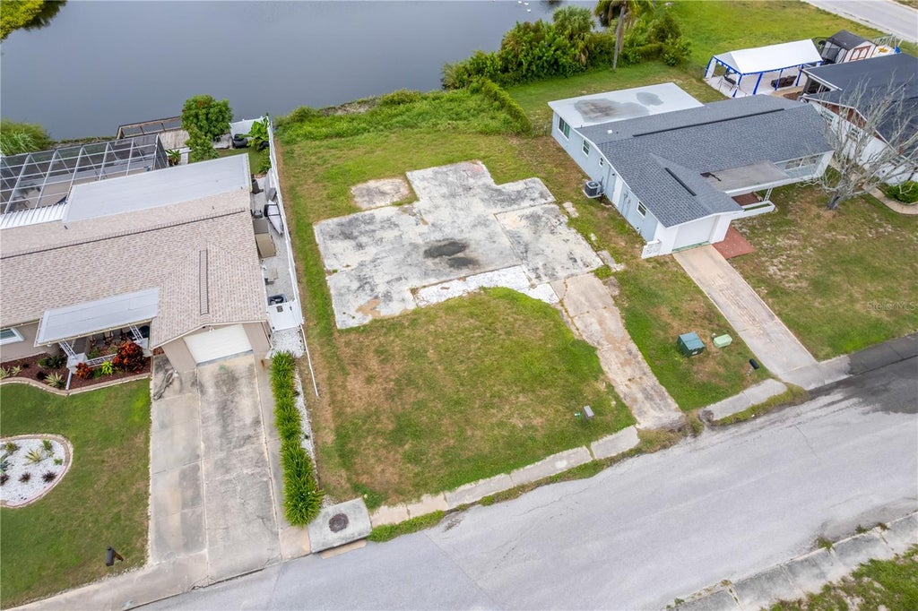 Photo of 11611 Scallop Drive, Port Richey, FL 34668 (MLS # TB8553102)