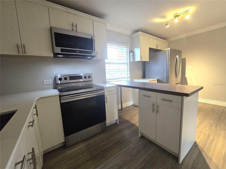 Great Opportunity!! Completely remodeled, 4 bedroom 1 and half bathroom, 2 story condo located in excellent area next to Sorority row and few blocks from UF, Shands Hospital and Downtown. Wood laminated flooring in living room and bedrooms, stainless steel appliances, kitchen completely equipped. Kitchen with stainless steel appliances. Complex with pool, parking stickers offered to all residents. WATER, TRASH, WASTE included in the monthly association fees.