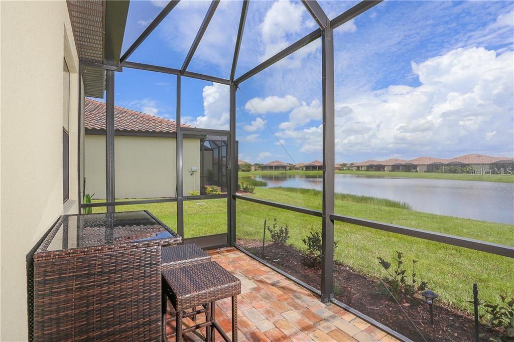Seasonal: rental property located in the gated community of Riverstrand/Heritage Harbour. Enjoy living in this completely decorated villa that was built in 2016 and ready for you to enjoy the Florida lifestyle. This two bedroom two bath villa, offers a king size bed in the master bedroom with a private bath, and queen size beds in the guest bedroom and den. The kitchen offers granite countertops and stainless steel appliances. Enjoy the beautiful Florida sunsets while relaxing on your screened in lanai and overlooking the pond. Social Membership can be transferred for $200.00. This membership does not include golf. Enjoy the Tuscan-Clubhouse, State-of-the-Art Fitness Center, Resort Style and Exercise Pools, Professional quality tennis courts, Billiards, & Card Rooms. Great location close to downtown Sarasota, Lakewood Ranch, beaches, I-75. Sorry, no pets are allowed.