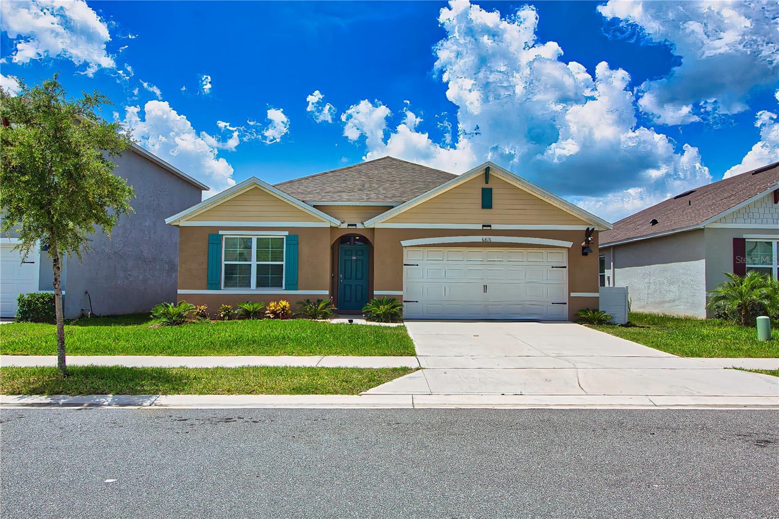 Built in 2022, this beautifully designed 4-bedroom, 2-bathroom offers a modern layout with style, space, and energy efficiency. Nestled in the peaceful Villages at Harmony community, this single-story home features a bright, open-concept design ideal for entertaining. Enjoy a spacious kitchen with stainless steel appliances, a large island, and ample counter space, seamlessly flowing into the dining and living areas. The private primary suite includes a walk-in closet and an en-suite bath with double vanities and an oversized shower. Step outside to a covered lanai and a private backyard perfect for relaxing. Additional features include a 2-car garage, smart home technology, and energy-efficient systems like low-E windows and central HVAC. Located just minutes from top-rated schools, parks, and commuter routes, Harmony West also offers resort-style amenities including a community pool, playgrounds, sidewalks, and more.