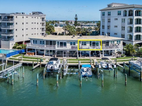 Photo of 205 Dolphin Point #6, Clearwater, FL 33767 (MLS # TB8560563)