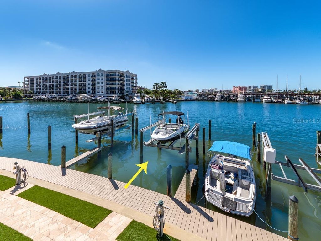 Photo of 205 Dolphin Point #6, Clearwater, FL 33767 (MLS # TB8560563)