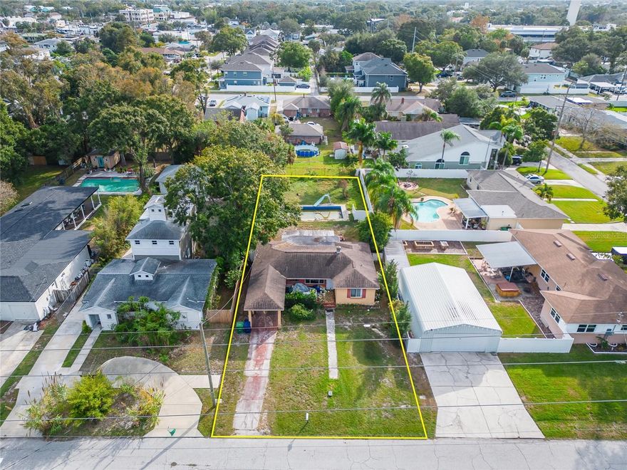 This hidden gem of a lot, nestled in a serene Tampa neighborhood just a stone's throw away from the heart of Midtown, is your chance to make an indelible mark on this vibrant community! Envision the convenience of strolling to Midtown's eclectic shops and dining spots, soaking up the local energy, all while enjoying the tranquility of this exceptional piece of land. With a generous expanse and limitless potential, this lot is more than just a property; it's your blank canvas to shape and contribute to the enrichment of life in Tampa. From the possibility of meticulously designing a lush garden to the option of building the luxury residence you've always imagined, this lot offers a spectrum of exciting opportunities. It's not just a lot; it's your chance to sculpt your own unique story in Tampa, right here. Seize this opportunity to bring your dreams to life!