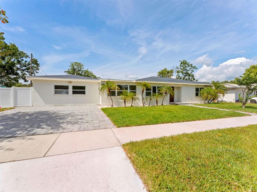Beautifully renovated 4 bedroom, 3 bathroom move-in ready pool home in a highly desirable Clearwater/Dunedin location offering the ultimate Florida lifestyle! This stunning property features a spacious open concept floor plan with a bright living and dining area, perfect for entertaining, along with a fully updated modern kitchen complete with brand-new stainless steel appliances, custom cabinetry, and stylish backsplash, plus new luxury flooring throughout. The oversized primary suite includes a private en-suite bathroom, creating a relaxing owner’s retreat. Step outside to a screened-in patio overlooking a large, fully fenced backyard with brand-new sod and irrigation system, ideal for pets, families, and outdoor gatherings, all centered around a SPARKLING 12.5 INCH DEEP IN GROUND POOL perfect for year round sunny Florida living. Located just minutes from Downtown Dunedin, Downtown Clearwater, and the world known/award winning Clearwater Beach, this home offers quick access to top-rated restaurants, shopping, parks, marinas, golf courses, and coastal attractions. Ideal as a primary residence, vacation home or investment property, this home checks every box with no detail overlooked featuring updated systems, modern finishes, curb appeal, and prime location. A rare opportunity to own a turnkey Clearwater pool home near the beach with NO HOA, strong rental potential, and high buyer demand - schedule your private showing today!