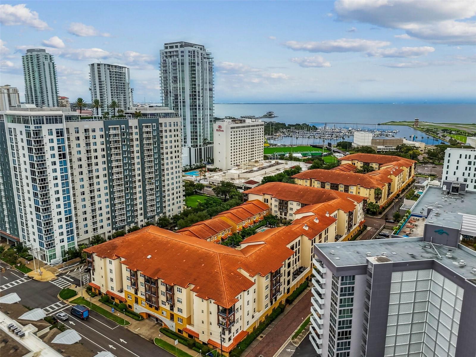 2 BEDROOM 2 BATH CONDO, DOWNTOWN St. Petersburg! The MADISON, Located in the heart of DOWNTOWN St. Petersburg! This RESORT style building offers a HEATED swimming pool! Jacuzzi! Fitness Center and Underground Parking! Downtown St. Petersburg offers GREAT restaurants, shopping and a WONDERFUL cultural connection with Museums and Live Musical events! Close to the DALI MUSEUM and VINOY PARK! This GORGEOUS REMODELED spacious condo overlooks the COURTYARD with views of the SWIMMING POOL! As you enter this condo, you will be amazed by the quality of UPGRADES and the BEAUTIFUL DECOR! Stainless Steel Appliances! Granite Countertops! Luxury Vinyl Plank Flooring! Living/Dining Area. Breakfast Bar! Inside laundry room with Washer & Dryer! A LARGE MASTER SUITE with a WALK IN Closet! The MASTER BATH has a GARDEN SOAKING TUB! Enjoy the view from the PATIO off the Living/Dining Area! This condo also comes with a STORAGE CLOSET right outside your door! One Assigned underground COVERED PARKING spot! A second parking space is available for a monthly fee of $150. This condo can rented FURNISHED or UNFURNISHED! Water, Sewage and Garbage included! Pet ok with $350 fee. Tenants are required to have renters’ insurance for their personal property and 300k liability with the owner as additionally insured.