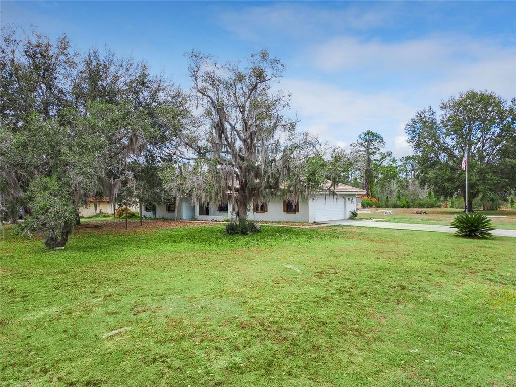 Photo of 4250 Valencia Drive, Indian Lake Estates, FL 33855 (MLS # O6384547)