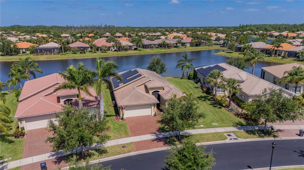 Photo of 16139 Coquina Bay Lane, Wimauma, FL 33598 (MLS # TB8379568)