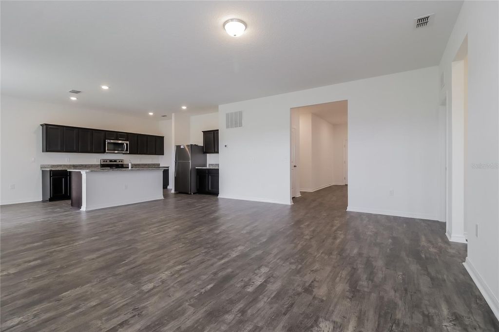 Photo of 101 Hidden Lake Loop, Haines City, FL 33844 (MLS # O6360306)