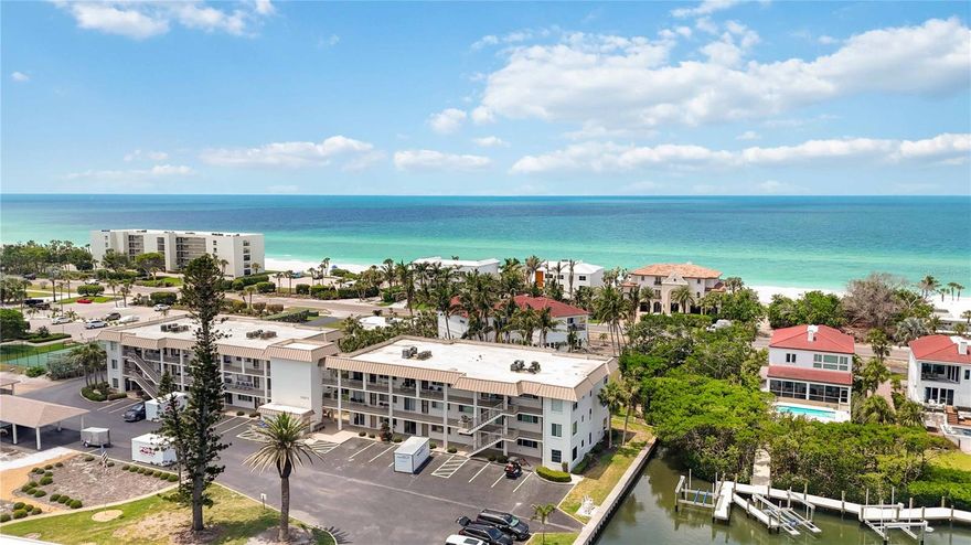 Modern Waterfront Living in the Heart of Longboat Key-Experience the best of coastal living in this beautifully renovated 2-bedroom, 2-bathroom condo, perfectly situated on the water in one of Longboat Key’s most desirable communities. This light-filled residence features a newly reimagined open-concept kitchen with gleaming quartz countertops, bright modern cabinetry, premium stainless steel appliances, and recessed lighting—creating a fresh and inviting space ideal for entertaining. The seamless flow continues into the dining and living areas, enhanced by high end LVP updated flooring throughout. Both bedrooms offer comfort and tranquility, complemented by two spa-like bathrooms boasting high-end finishes, updated designer fixtures and fans throughout along with shiplap accents. A brand-new HVAC system ensures year-round comfort, electric panel replaced 3 years ago. Enjoy picturesque water views and take advantage of the community’s exceptional amenities, including a recently renovated heated waterfront pool, tennis courts, private kayak launch, waterside seating areas, and boat docks available for rent.
Located just minutes from your deeded beach access, you’re perfectly positioned to enjoy the sunrises, sunsets, and pristine shores of the Gulf of Mexico. Indulge in nearby fine dining at local favorites like Dry Dock Waterfront Grill, Mar Vista, Shore, Euphemyia Haye and Maison Blanche. Shopping and entertainment await at nearby St. Armands Circle, Lido Key, and downtown Sarasota.
Convenient to Publix, fitness centers, banks, golf and tennis courts, and more, this property offers the perfect blend of luxury, location, and low-maintenance living. Whether you’re seeking a year-round residence, vacation home, or investment opportunity, this stunning condo delivers exceptional value in a premier coastal setting.