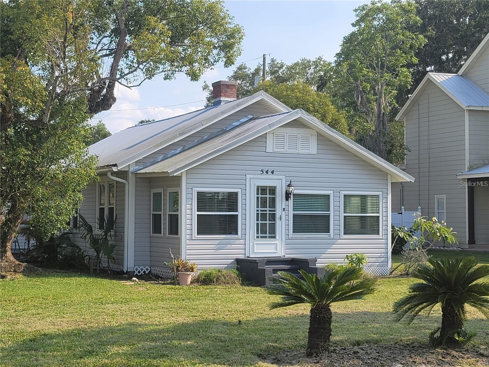 Historic Bungalow Downtown Winter Garden right on Main Street. Next to all shops, restaurants, farmers market, entertainment & West Orange Trail. Home features open floor plan with large enclosed front porch. Double sided decorative fireplace. Large laundry room. Large walk-in closet in master with built-in shelving. Oversized corner lot.