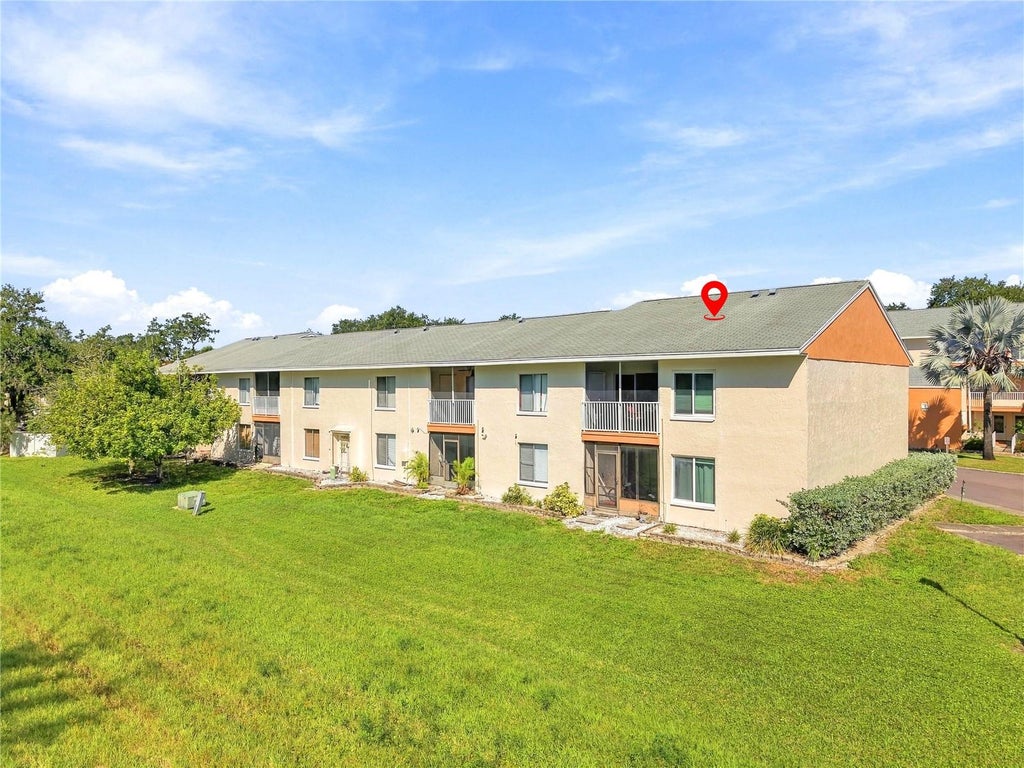 Photo of 690 99th Avenue N #201, St Petersburg, FL 33702 (MLS # A4710517)