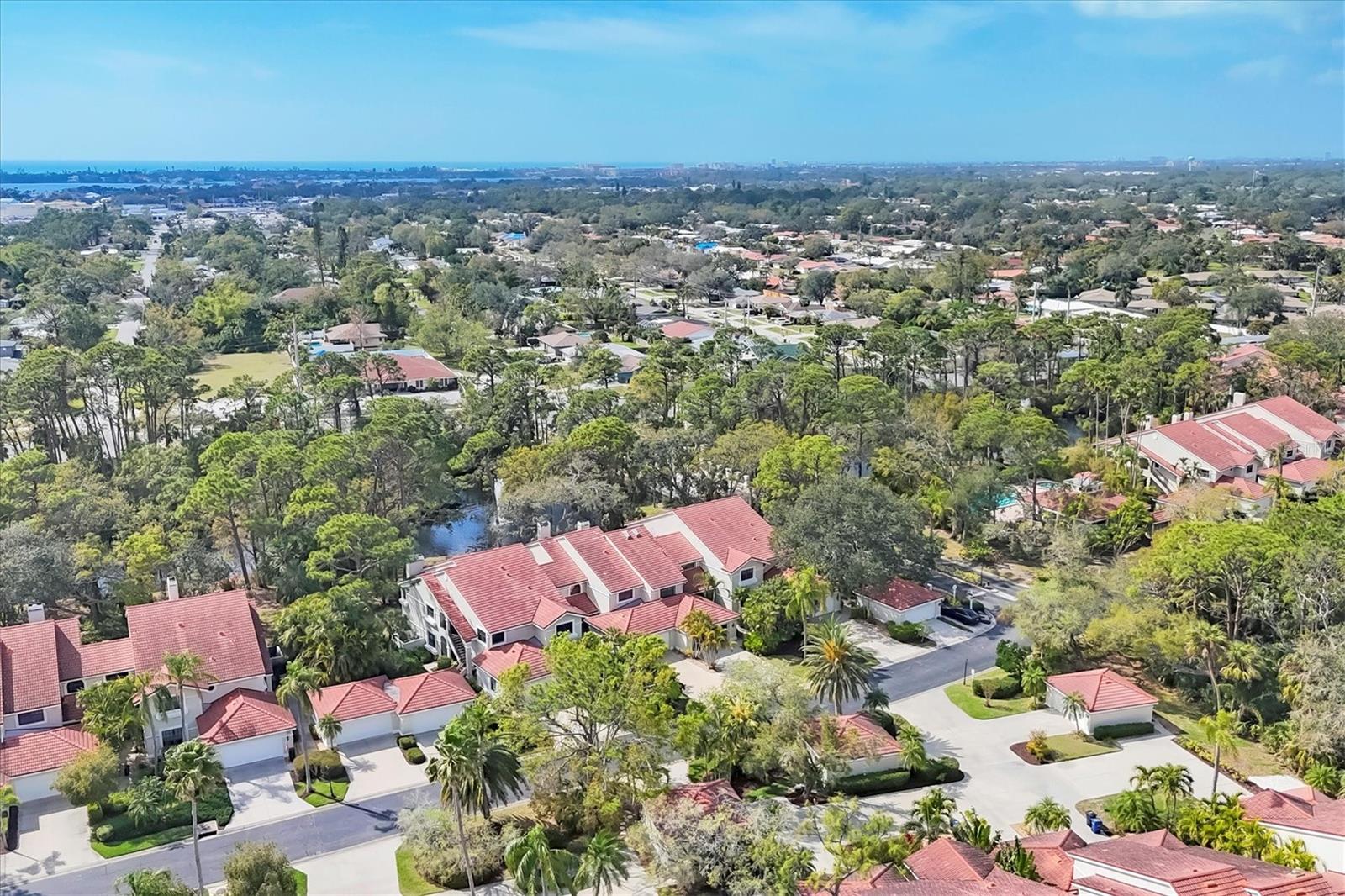 WELCOME HOME... Beautiful corner unit condo overlooking private pond with serene water views, mature trees and lots of wildlife. This spacious property offers oversized bedrooms with high ceiling, charming living room with wood burning fireplace, replacement windows, remodeled master, walk in shower, Private lanai, 2 car garage heated community pool and spa with large covered grilling area. Fairway Woods is a gated active community designed by Arthur Rutenberg and is conveniently located near shopping, dining, golf courses and just a short drive to Siesta Key Beach and Downtown Sarasota. Home is tastefully furnished and ready for the New owner. Will consider selling furnishings on separate sale bill. A GREAT PLACE TO SPEND THE SEASON OR A LIFETIME.