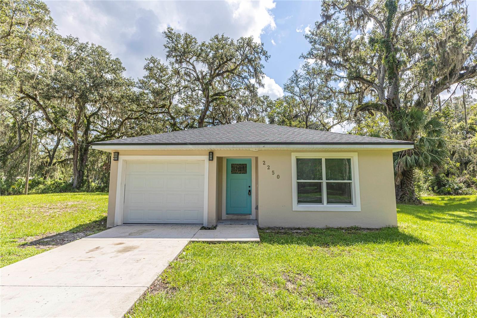 Looking for a vacation or retirement home? Look no further with this block home built in 2022. This 3 bedroom 2 bath home boasts a great location, near Lake Panasoffkee, 1 hour from Orlando or Tampa, and close by The Villages. Easy access to the turnpike or I-75 and CR 44 for easy commutes to work, road trips or local getaways. Great location for an avid fisherman, hiker, or recreation enthusiasts with Lake Panasoffkee right down the road! For those preferring to stay at home and hope to glance at some wildlife, you're in luck too with the large mature oaks on property. This yard provides ample space for your dog to run around, or to work on a project. With no HOA, you can tinker on a Saturday project, or store your RV or airboat with peace of mind. Storage space or parking in your attached one car garage provides several options. This home contains granite countertops and ceramic tile throughout and is vacant and easy to tour. Call for your showing appointment today!