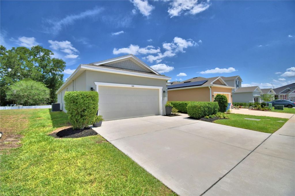 Photo of 868 Blue Creek Drive, Haines City, FL 33844 (MLS # P4938642)