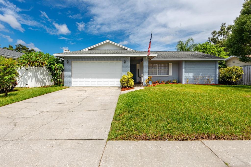 Photo of 1844 Teakwood Lane, Dunedin, FL 34698 (MLS # TB8429274)