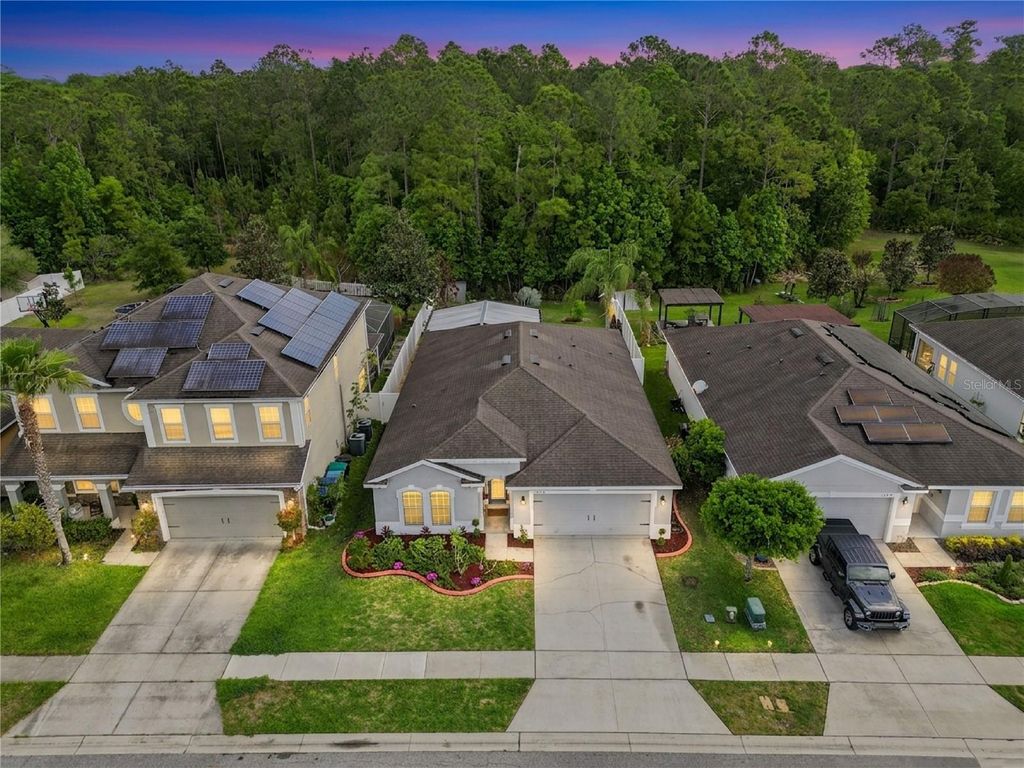 Photo of 10756 Inside Loop, Orlando, FL 32825 (MLS # O6395557)