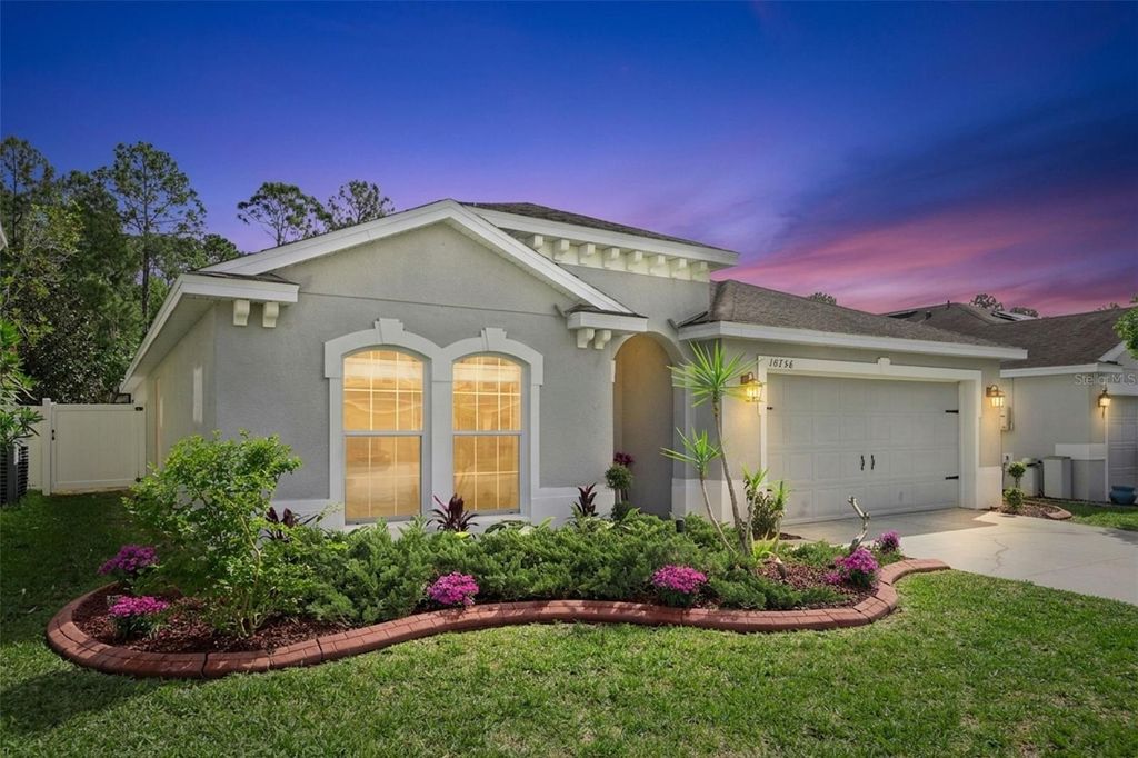 Photo of 10756 Inside Loop, Orlando, FL 32825 (MLS # O6395557)