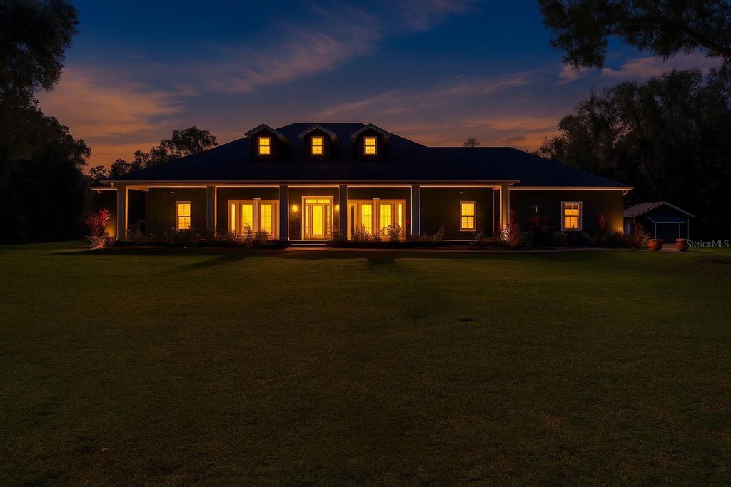 Photo of 1910 Glenwood Oaks Lane, Deland, FL 32720 (MLS # V4946038)