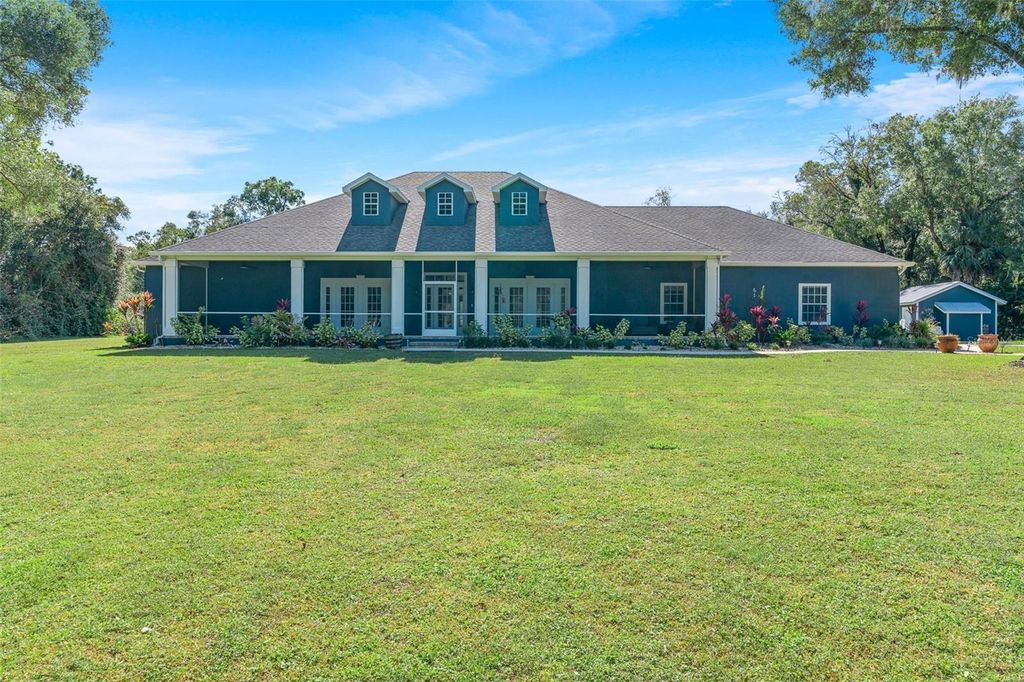 Photo of 1910 Glenwood Oaks Lane, Deland, FL 32720 (MLS # V4946038)