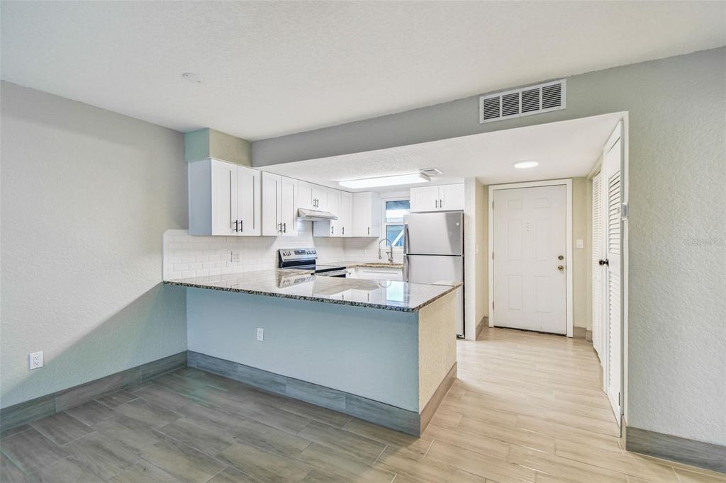 Photo of 4829 Onyx Lane #101, New Port Richey, FL 34652 (MLS # TB8412955)