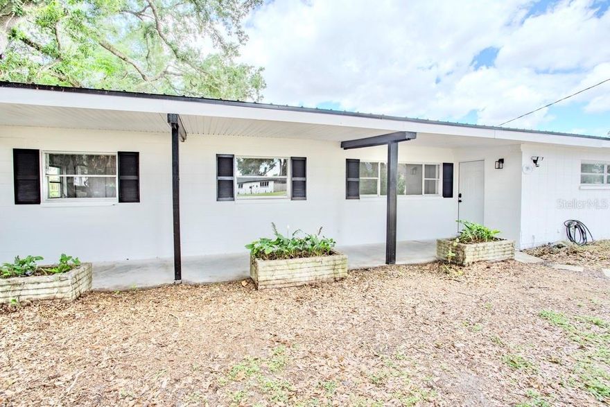 What a unique Lakeland property! Situated on a spacious .59-acre lot, this property is designed for both everyday comfort and entertaining. Fully renovated and move-in ready, this 4-bedroom, 2.5-bath home offers an incredible layout with a HUGE BONUS ROOM featuring a private entrance, creating exceptional flexibility for guests, hobbies, a home office, or fitness space.  
Inside, you’ll find thoughtful updates throughout, including all-new laminate flooring, new sliders, ceiling fans, recessed lighting, beautifully tiled bathrooms with waterfall faucets and rain shower heads, and a gorgeous updated kitchen featuring marble countertops, a breakfast island, new cabinetry with elegant gold hardware, and stainless steel Frigidaire appliances. For added peace of mind, the home also offers a durable metal roof, outdoor flood lights, a solid slab foundation, and glorious mature trees that provide shade, privacy, and character.
At the heart of the home is a private outdoor retreat featuring a large screened lanai, an oversized in-ground pool, and a FULLY WIRED SPACIOUS FLEX STUDIO that's perfectly positioned between the lanai and the 2-car garage.  This is a must see!  The garage also includes a workshop, ideal for projects, storage, or additional workspace.
The location is just as impressive, set in a walkable Lakeland area surrounded by parks, recreation, and outdoor amenities, including convenient access to the Three Parks Trail East corridor along New Jersey Road. Enjoy being close to local parks, walking and biking opportunities within approximately one mile, marinas, Cleveland Heights Golf Course, shopping, dining, schools, and everyday conveniences, all while coming home to your own private poolside retreat.  One or more photos are virtually staged.