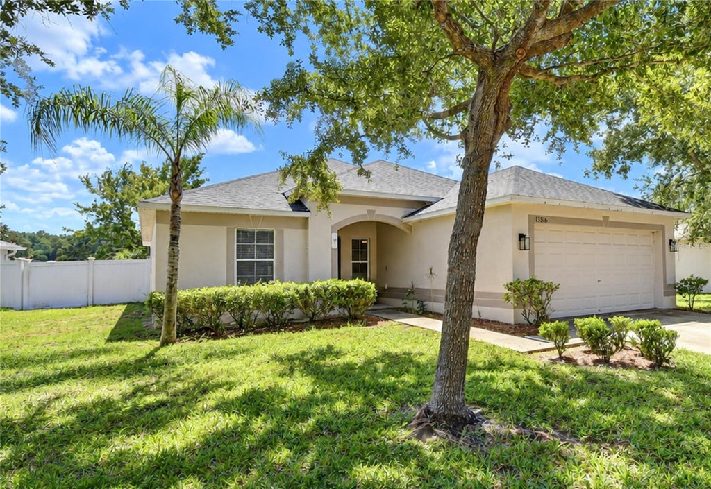 Photo of 13816 Caden Glen Drive, Hudson, FL 34669 (MLS # TB8549356)