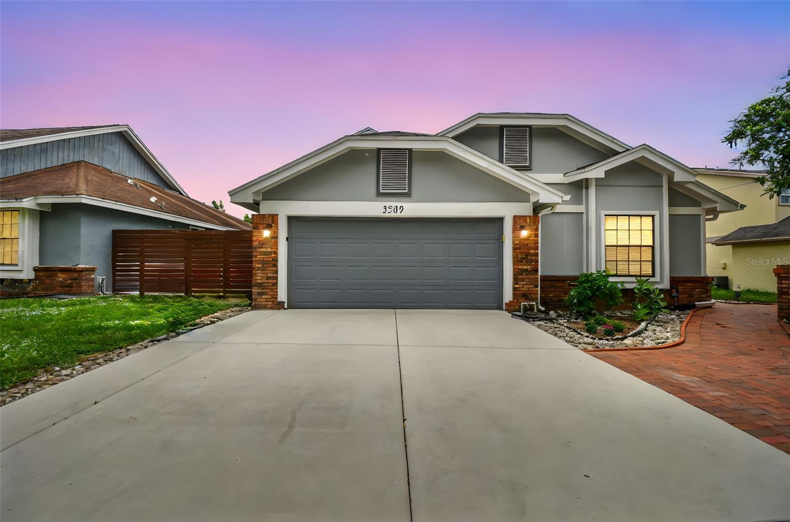 Your Dream Home Awaits – Water Views & Luxury Renovations!
Step into elegance at 3509 Exeter Court, a completely renovated home nestled on a quiet cul-de-sac with breathtaking views of Lake Farrar. This stunning home offers the perfect blend of comfort, modern upgrades, and scenic charm. The perfect blend of luxury and tranquility.
Stroll outside and experience your own slice of paradise. A screened-in back porch opens directly to a spacious deck overlooking the water—ideal for relaxing evenings, BBQs, or morning coffee with a view. The brick paver driveway adds instant curb appeal, and the large backyard offers room to play, entertain, or just enjoy the peaceful setting.
This home has been completely reimagined with high-end finishes and thoughtful design throughout: Vaulted ceilings create a bright, airy atmosphere NEW bamboo flooring flows seamlessly through the living areas A chef’s kitchen featuring granite countertops, brand-new cabinetry, new appliances, and a walk-in pantry The giant master bedroom is a true retreat, complete with a cozy electric fireplace A spa-like, fully renovated master bathroom boasts a his-and-hers shower, garden tub, and modern finishes Updated guest bathroom with fresh, contemporary design NEW AC, electrical, and plumbing for peace of mind Large downstairs workstation—perfect for a home office or creative studio. Enjoy stunning lake views from the living room, kitchen, and master bedroom!
Community Amenities: Live in comfort with access to two lakeside swimming pools, tennis courts, clubhouse, and walking trails shaded by mature trees and lush landscaping. Unbeatable Location: Minutes from Publix, Lee Vista Promenade (movie theater, dining), Fashion Square Mall, and Orlando International Airport (OIA). Easy access to downtown Orlando and major highways.