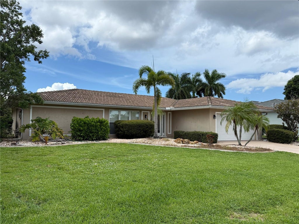 Photo of 821 Via Tunis, Punta Gorda, FL 33950 (MLS # C7529455)