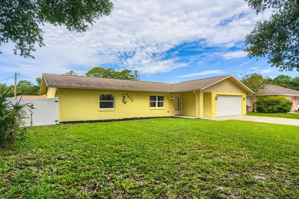 Photo of 3432 Unity Tree Drive, Edgewater, FL 32141 (MLS # TB8524792)