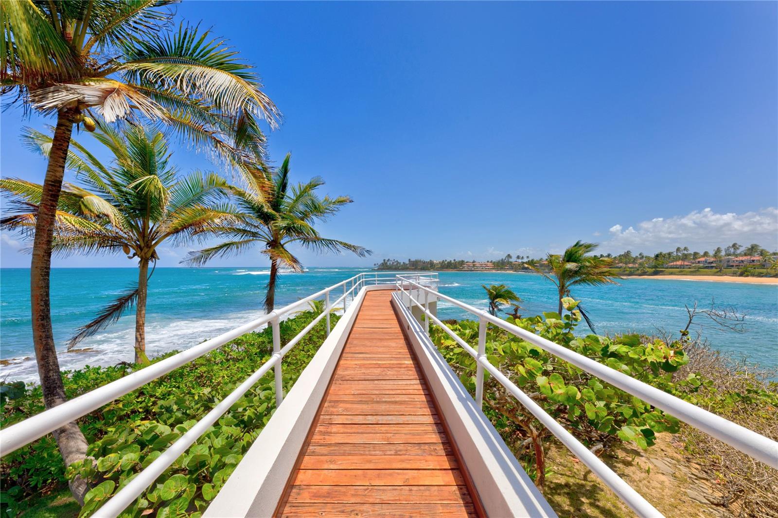 Enjoy unmatched panoramic views and direct beach access from this one of a kind home. Originally designed and conceived in 1978, by renowned architect Segundo Cardona. In 2006, the home received the American Institute of Architects' Test of Time Award. The structure is also known as the House at Brenas Point, the two-level property provides a clean open space with a wonderfully serene aesthetic that serves as the perfect setting to create your ideal home with all of the modern amenities it calls for. The current structure is enriched by wooden accents throughout and a tranquil ambience surrounded by the sea on all sides. Currently two bedrooms and two bathrooms, as well as a spacious kitchen, double-height great room, north-facing sunroom, balcony and multiple decks overlooking the water from different vantage points. 70 Brenas Estate is truly a rare and treasured find that offers potential owners the unique opportunity to create a 21st Century residence with grand cultural and historic significance. Vega Alta, is a coastal beach town located on the northern coast of Puerto Rico. The area is known for its stunning white sand beaches and forest filled with diverse flora. The region is also home to numerous well known restaurants. Only 10 minutes away from Dorado Beach and all of the amenities it has to offer such as top golf courses, spa sanctuary, fitness center, biking trails and water sport facilities. A 45-minute drive away from San Juan.