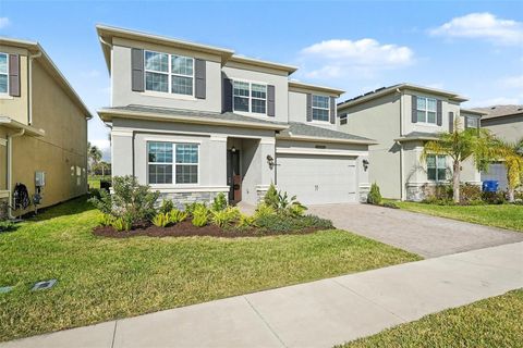 Photo of 32745 Tamarind Grove Lane, Wesley Chapel, FL 33543 (MLS # TB8459137)