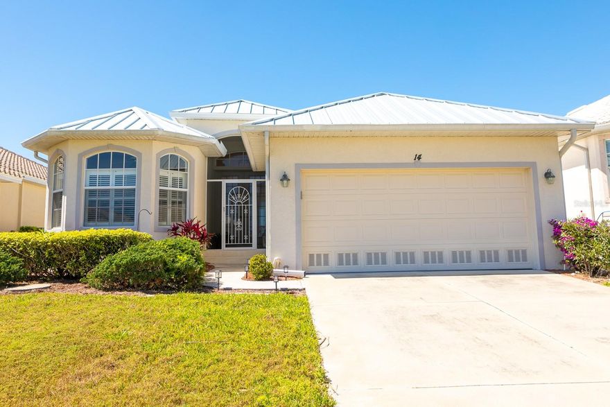 MOTIVATED SELLER Major price reduction and the seller will pay $10,000 toward buyer's closing costs. Situated in Cape Haze Windward on The Links 18-hole golf course, this maintenance-free property offers irrigation, exterior pest control, lawn care, and landscaping services. Enjoy the stunning Florida sunsets from the enclosed patio overlooking the course, complete with large sliding doors for an indoor-outdoor experience. The primary suite features a sliding door to the lanai and an ensuite bathroom. Additionally, there is an indoor laundry room, two guest bedrooms and a guest bathroom. The property is equipped with public water, sewer, and underground utilities. It is conveniently located between Boca Grande Beach, multiple golf courses, boutique shops, grocery stores, restaurants, a post office, marina, fire/EMS station, hardware store, and fuel station.